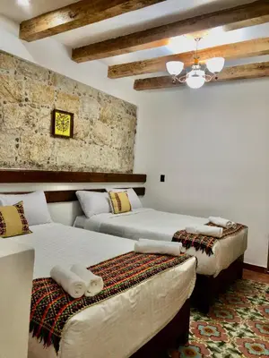 Cama o camas de una habitación en Hotel Boutique Los Ángeles