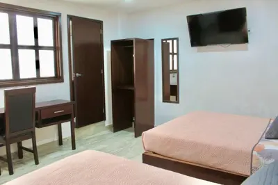 Cama o camas de una habitación en Hotel ESTRELLA