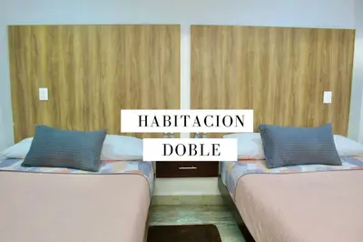 Cama o camas de una habitación en Hotel ESTRELLA