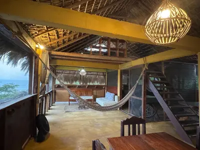 Zona de estar de Cabaña con vista al mar y wifi Starlink en San Agustinillo