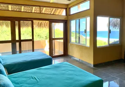 Cama o camas de una habitación en Departamento con vista al mar, Wifi Starlink y AC en Playa San Agustinillo