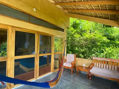 Un balcón o terraza de Departamento con vista al mar, Wifi Starlink y AC en Playa San Agustinillo