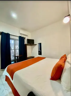 Cama o camas de una habitación en Pineda Real HOTEL