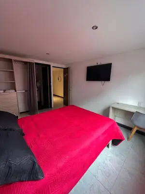 Cama o camas de una habitación en Hotel Urban Cholula