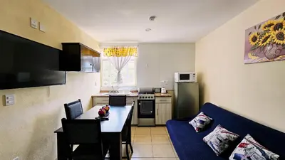 Una cocina o zona de cocina en Sensity Home Departamento 4, Confortable y céntrico todos los servicios