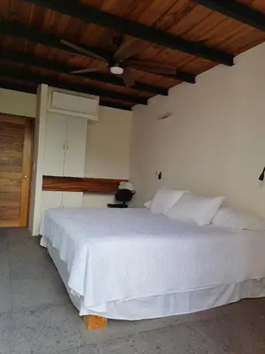 Cama o camas de una habitación en Casa Ilhe Ha