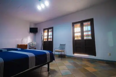 Cama o camas de una habitación en Hotel Posada Don Matías