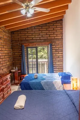 Cama o camas de una habitación en CASA ANTARES