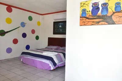 Cama o camas de una habitación en Hotel Bacaanda