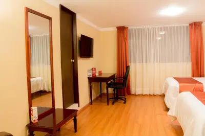 Cama o camas de una habitación en Hotel Suites Teziutlan