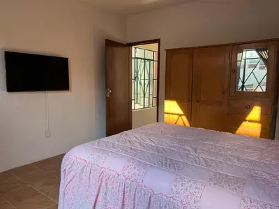 Una televisión o centro de entretenimiento en Casa del Zocalo