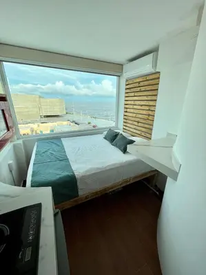 Cama o camas de una habitación en HABITACION, VISTA AL MAR