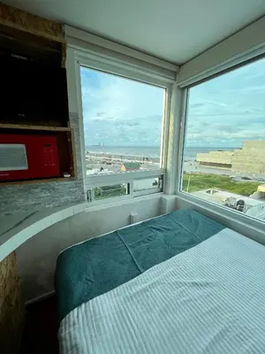 Cama o camas de una habitación en HABITACION, VISTA AL MAR