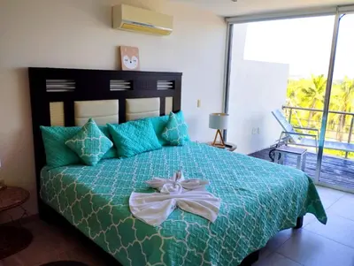 Cama o camas de una habitación en Playa & Piscina en Punta Gaviota