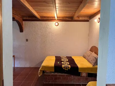 Cama o camas de una habitación en Posada Quetzalin