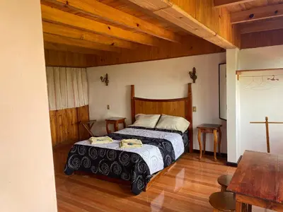 Cama o camas de una habitación en Posada Quetzalin