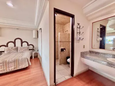 Cama o camas de una habitación en Global Express Puebla - FINSA