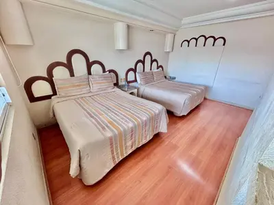 Cama o camas de una habitación en Global Express Puebla - FINSA