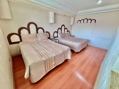 Cama o camas de una habitación en Global Express Puebla - FINSA