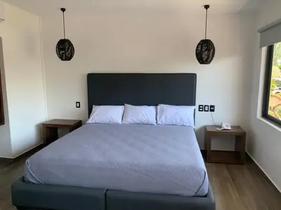Cama o camas de una habitación en Mar De Estrellas - Hotel