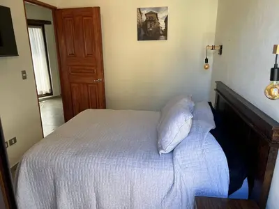 Cama o camas de una habitación en Loft River en el corazon de Valquirico