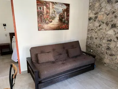 Zona de estar de Loft River en el corazon de Valquirico