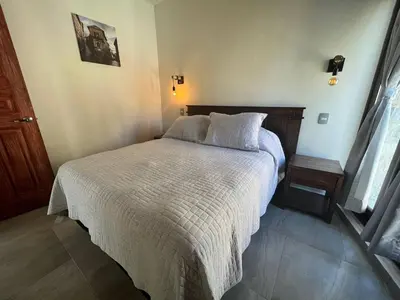 Cama o camas de una habitación en Loft River en el corazon de Valquirico