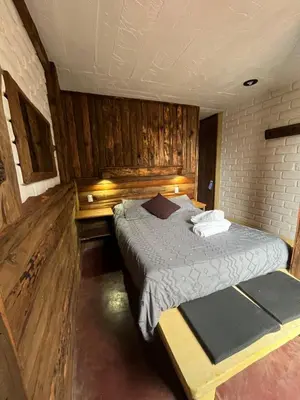 Cama o camas de una habitación en La Misión Hotel Chignahuapan