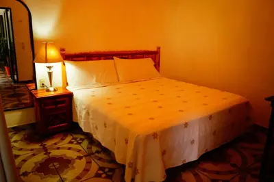 Cama o camas de una habitación en Hospedaje La Hoja