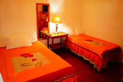 Cama o camas de una habitación en Hospedaje La Hoja