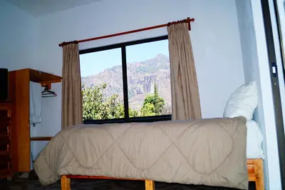 Cama o camas de una habitación en Hospedaje La Hoja