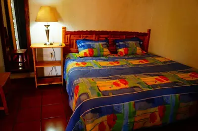 Cama o camas de una habitación en Hospedaje La Hoja