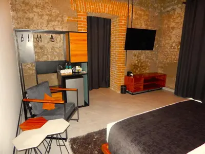 Cama o camas de una habitación en Hotel Tila