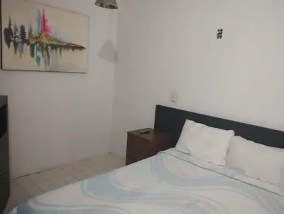 Cama o camas de una habitación en PROVENZA HOTEL & SUiTES