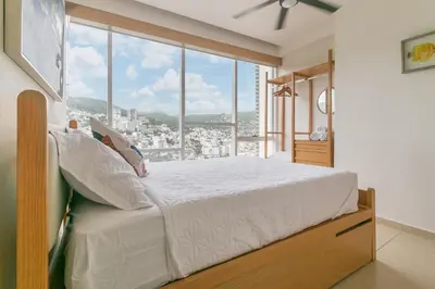 Cama o camas de una habitación en Amazing Condo Ocean View By Bamboo Skylife