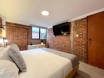 Cama o camas de una habitación en Mi Zona Lodging Coyoacán