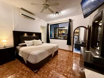 Cama o camas de una habitación en Casa Solar Boutique Eco-Hotel Confort Suite