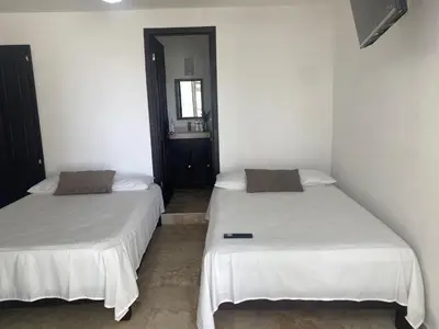 Cama o camas de una habitación en Hotel fresno Xochitepec