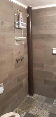 Un baño de OM Studio