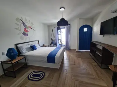 Cama o camas de una habitación en CASA NDOMI TEPOZ