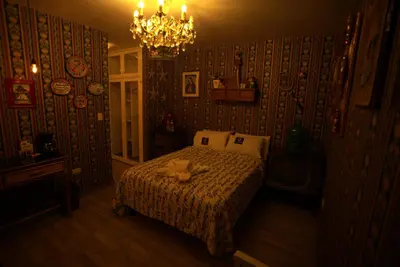 Cama o camas de una habitación en Hotel Temático Casa Puebla