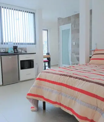 Una cocina o zona de cocina en Habitaciones Amubladas Logos II