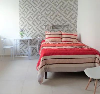 Cama o camas de una habitación en Habitaciones Amubladas Logos II