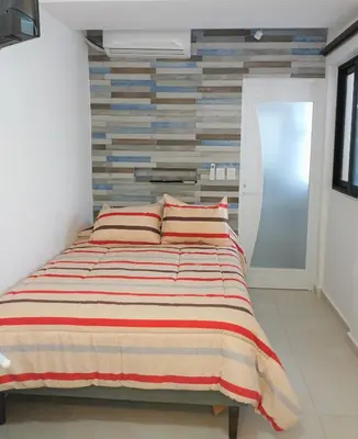 Cama o camas de una habitación en Habitaciones Amubladas Logos II