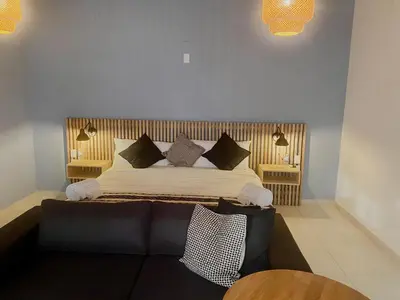 Cama o camas de una habitación en Cabañas Madre Tierra