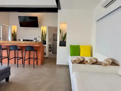Cama o camas de una habitación en Papaya Condo Acapulco Diamante -Solo Adultos