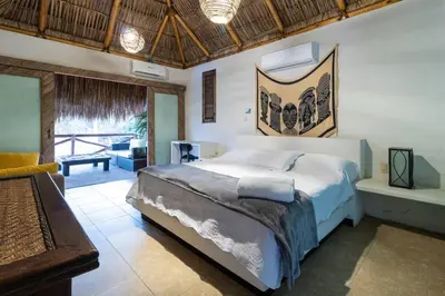 Cama o camas de una habitación en 6BR Casa Privada en Pie de la Cuesta