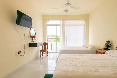 Cama o camas de una habitación en Hotel las flores