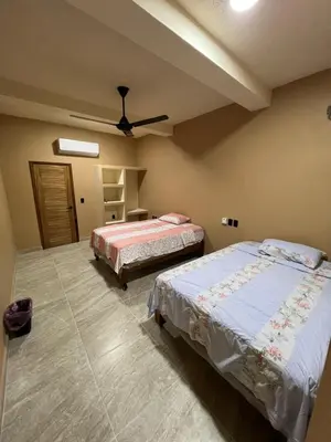 Cama o camas de una habitación en Hotel las flores