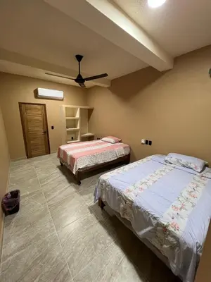 Cama o camas de una habitación en Hotel las flores